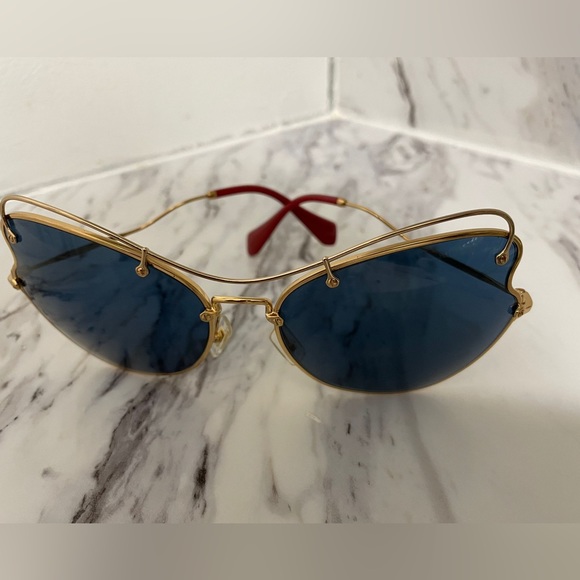 Miu miu SMU56R 7OE1V1 Sunglasses Women\'s Gold/Blue Cat Eye 65-19-135